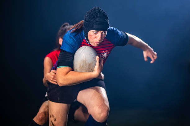 istock Rugby player tackling her opponent 1189585983