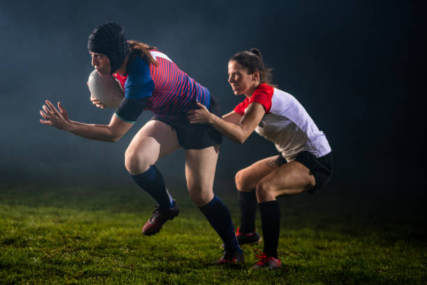 istock Rugby player tackling her opponent 1189585985