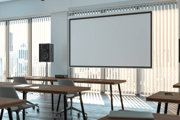 istock Projector screen canvas in modern conference room with big windows. 3d rendering. 1189586760