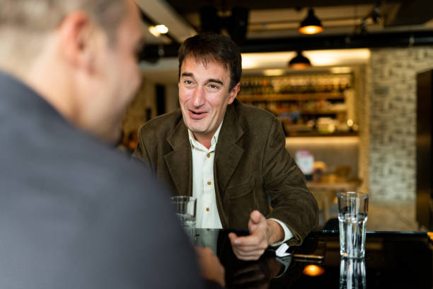 istock Two business people working in restaurant 1189587953