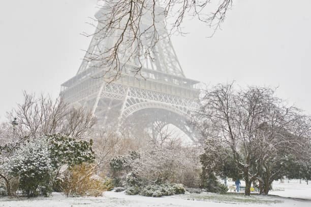 istock Scenic view to the Eiffel tower on a day with heavy snow 1189589420