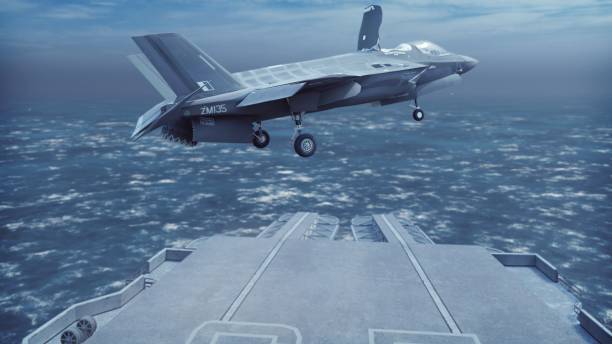 istock F-35 fighter takes off vertically from the aircraft carrier. 3D Rendering 1189592645