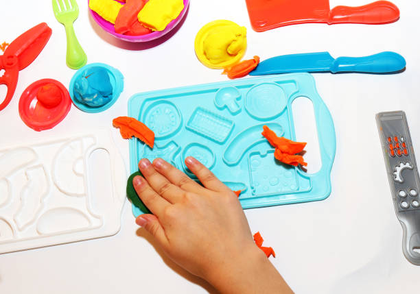 istock Child sculpts from plasticine figurines 1189595911