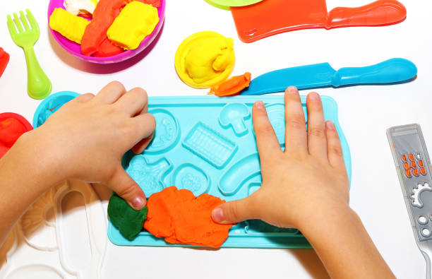 istock Child sculpts from plasticine figurines 1189595912