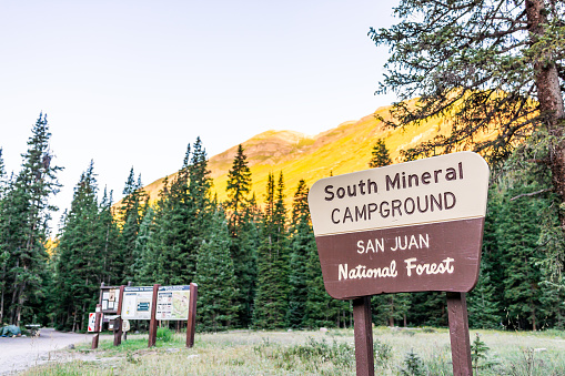 Silverton Ice Lake trail campground in Colorado in summer morning by Mineral Camp with entrance sign closeup