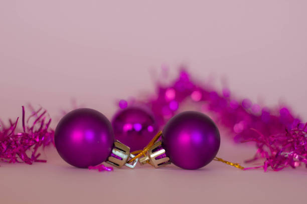 istock Close Up Two Purple Christmas Ornaments 1189605024