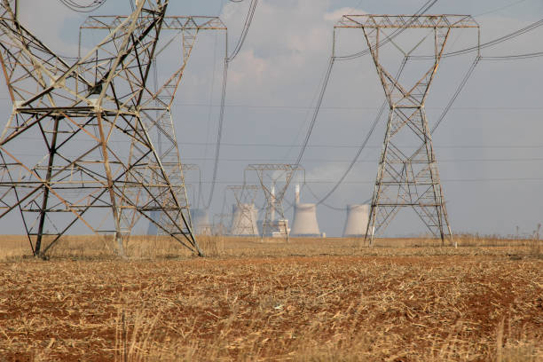 Vibrant Colored Image of two cooling towers of a nuclear power facility in Tennessee, USA on a Sunny Autumn Day. A facility like this creates jobs for the local economy, provides carbon-free electricity to the region, and reduces greenhouse gas emissions.