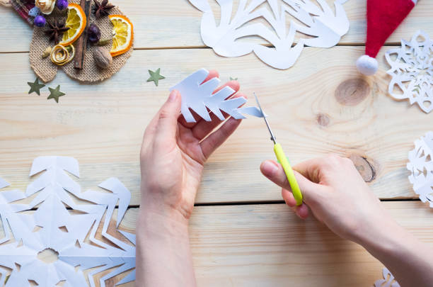istock homemade paper  snowflakes 1189605897