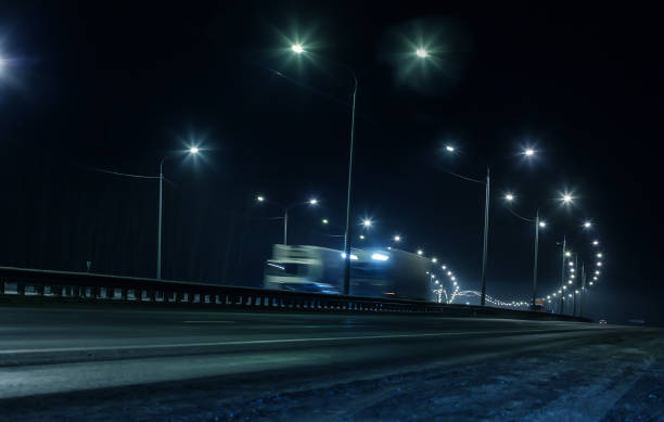 istock Truck traffic on a winter highway 1189607206
