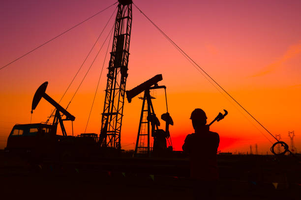 istock The oil workers in the job 1189613094