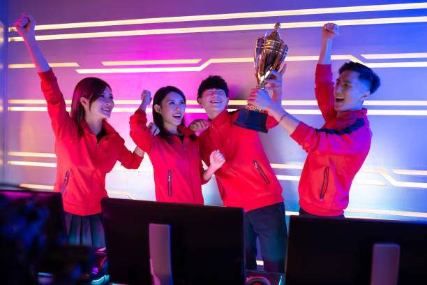 istock pro cybersport gamers get trophy 1189620351