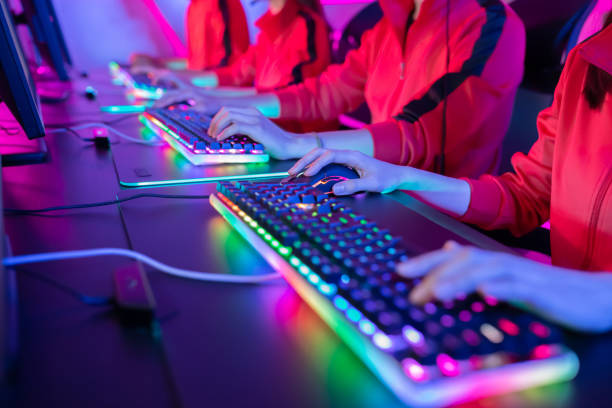 Esport RGB mouse and keyboard close up of pro cyber sport gamer play game with RGB keyboard and mouse esports stock pictures, royalty-free photos & images