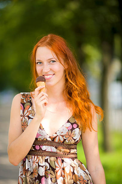 istock Woman eating ice-cream 118962392