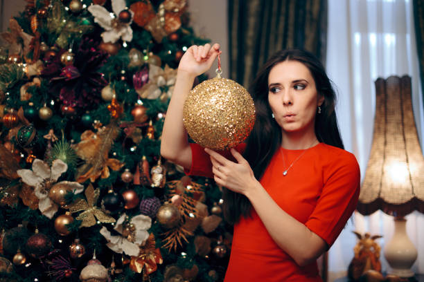 Party host preparing for holidays decorating the house