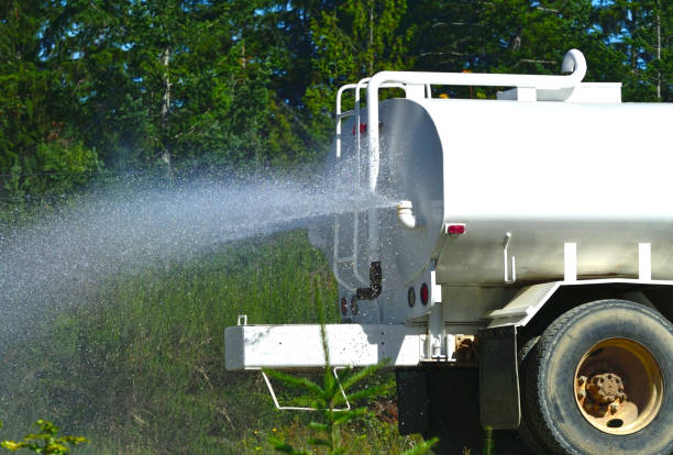 istock Dust Suppression Truck Spraying Water 1189627118