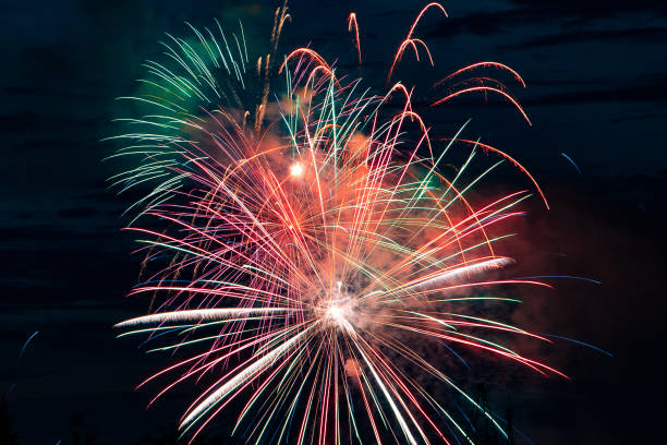istock Beautiful festive fireworks in the dark sky 1189634112