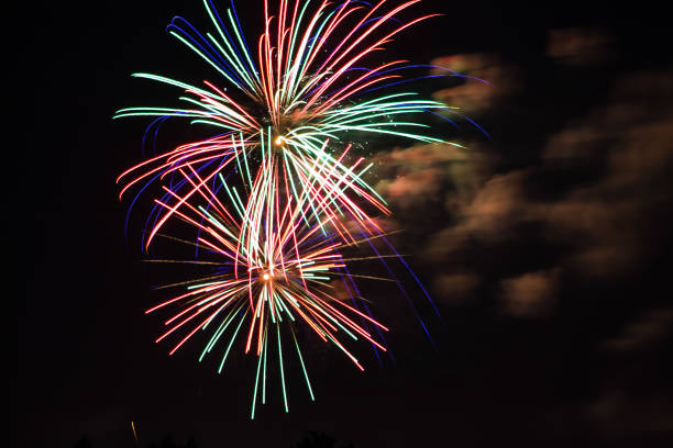 istock Beautiful festive fireworks in the dark sky 1189634236