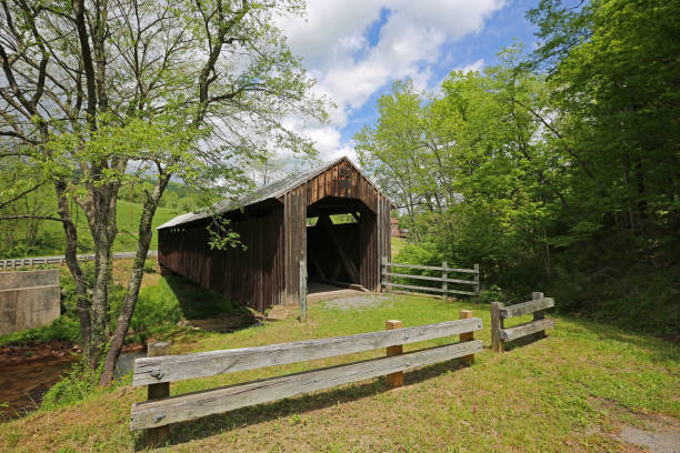 istock Landscape with Locust Creek covered bridge 1189637850