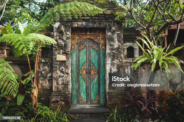 Traditional Balinese Handmade Carved Wooden Door Stock Photo - Download Image Now - Bali, Indonesia, Ubud