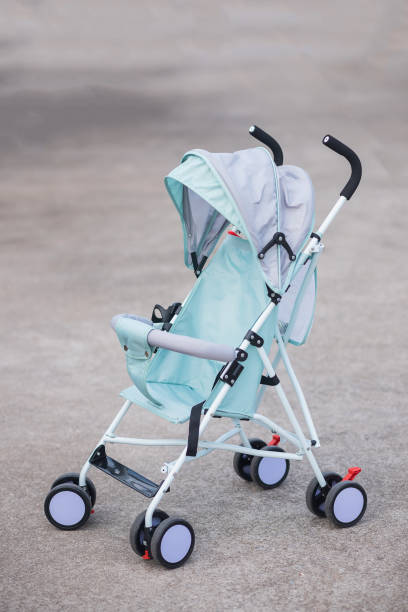 istock close up of stroller on gray background 1189654487