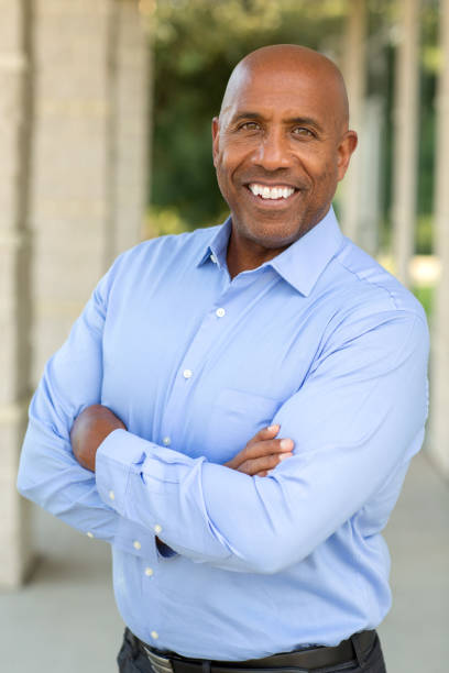 istock Happy mature African American man at work. 1189667578