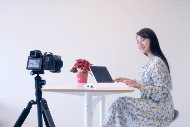 istock Social media woman talking with camera 1189667683