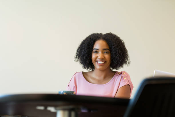 istock African American business woman at work 1189669950