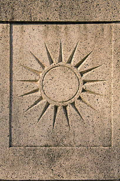 símbolo de sol - etching tan stone textured imagens e fotografias de stock