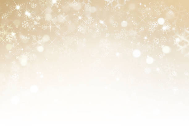 istock Golden background with snowflakes 1189684968