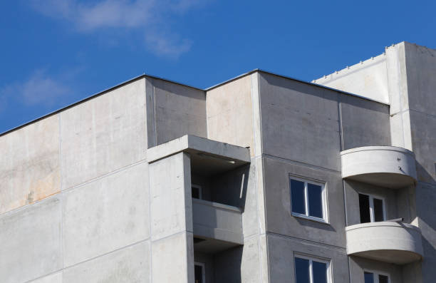 unfinished from large reinforced concrete slabs multi-storey residential house for people, photo from the construction site