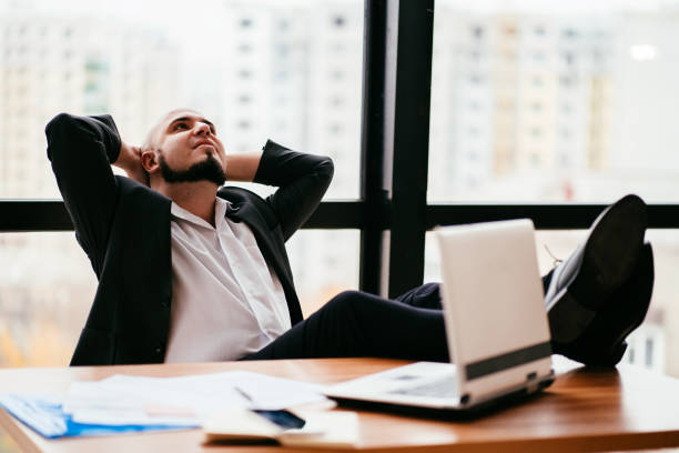 istock Successful businessman satisfied and relaxed 1189692592