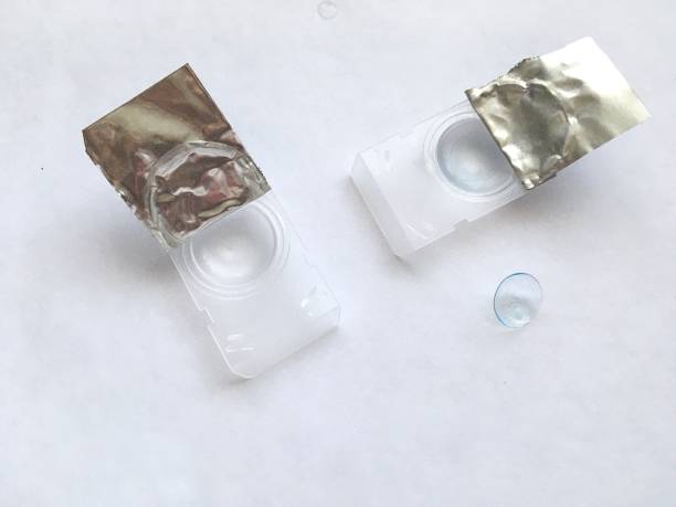 istock Contact lenses and blister packs on a white background 1189693797