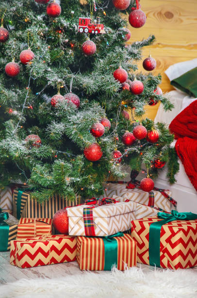 istock Christmas tree with decorations and gifts. Selective focus. 1189694135