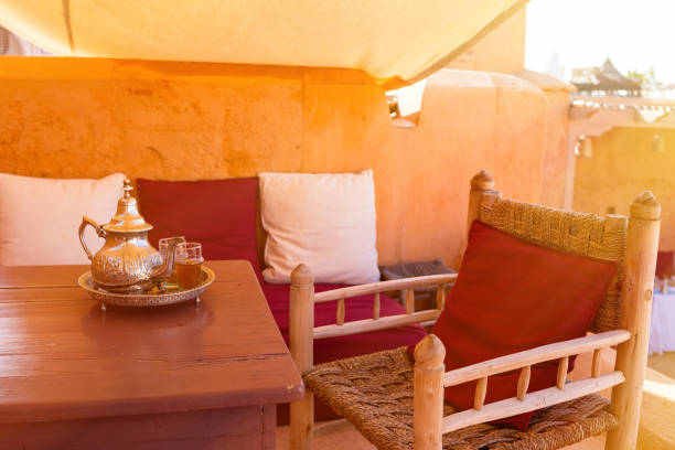 istock Traditional Moroccan mint tea served in a silver tea pot on a riad rooftop 1189698458
