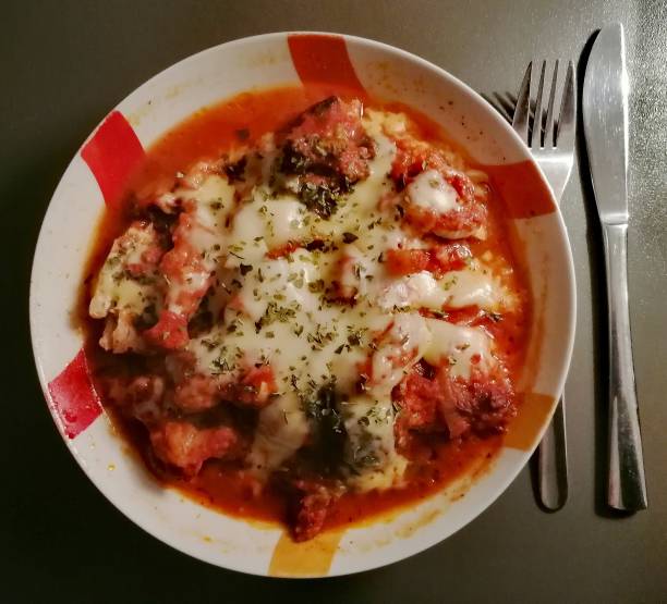 istock Baked chicken breast fillet with tomato sauce 1189699212
