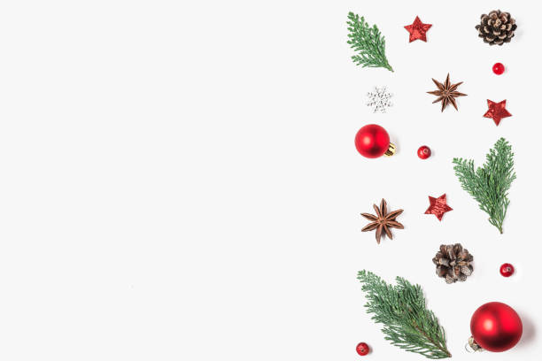 istock Christmas composition. Red decorations, fir tree branches, pine cones on white background. top view 1189699284