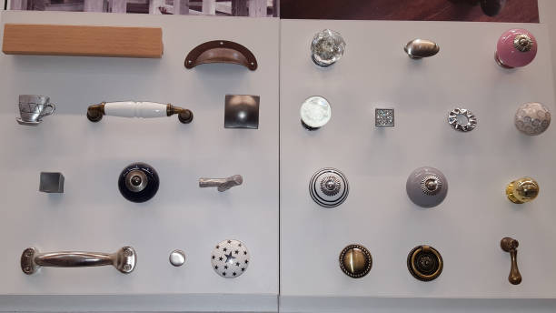 showcase of many closet door handles designed doorknobs on wooden board for sale in shop showcase of many closet door handles designed doorknobs on wooden board for sale in shop door lever stock pictures, royalty-free photos & images