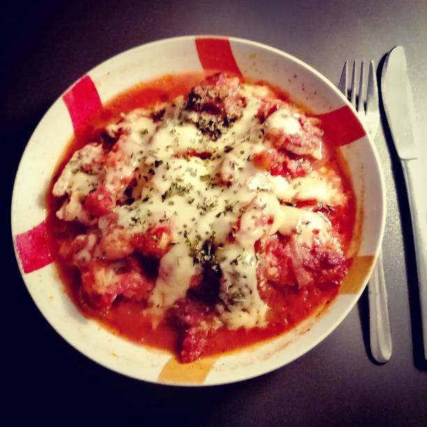 istock Chicken breast fillet with tomato cheese sauce 1189699393