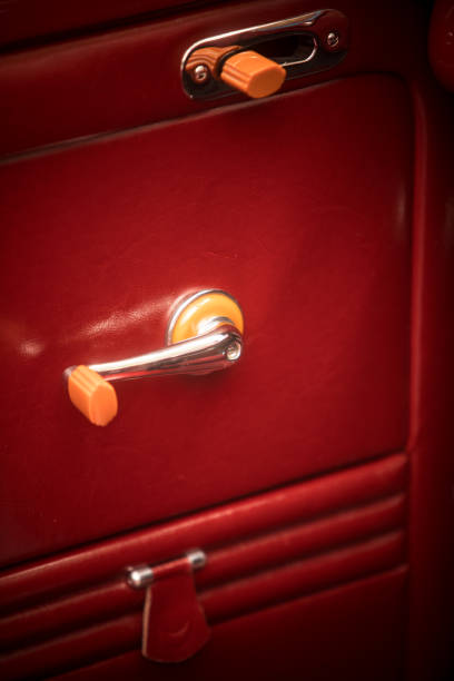 istock Window crank of vintage car 1189703259