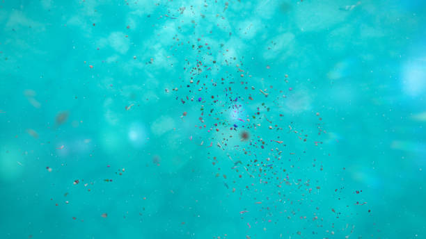 istock plastic pollution, micro nurdles and plastic particle in ocean water 1189706938