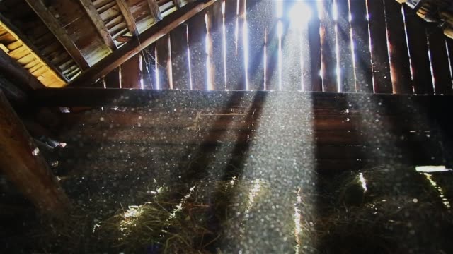 The sun's rays pass through the holes of the old attic HD 1920x1080
