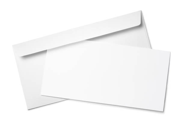 Paper in envelope on white Blank white paper in envelope, isolated on white background envelope stock pictures, royalty-free photos & images