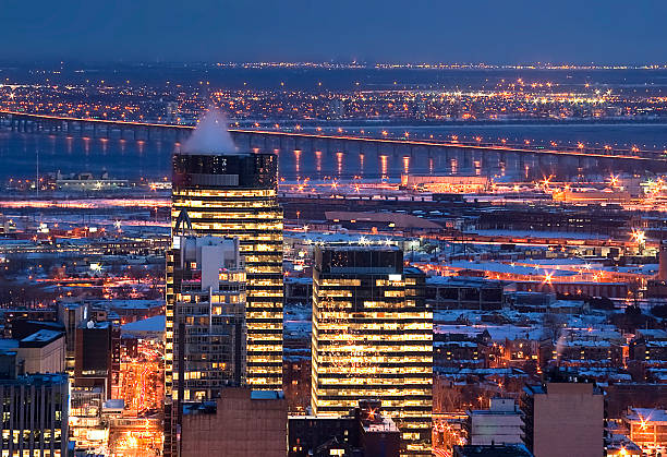 istock downtown skyline montreal river and bridge by night 118970925