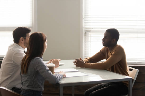 istock African American male candidate talk at work interview 1189709667