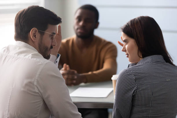 istock Doubtful recruiters dislike male work candidate at interview 1189709671
