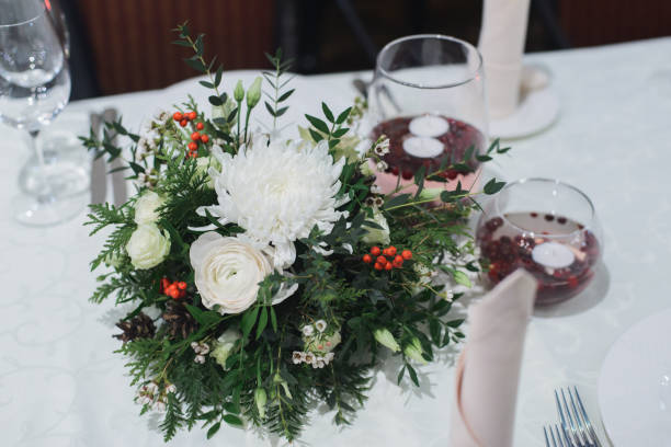 istock marriage flower arrangement on table for wedding 1189710858