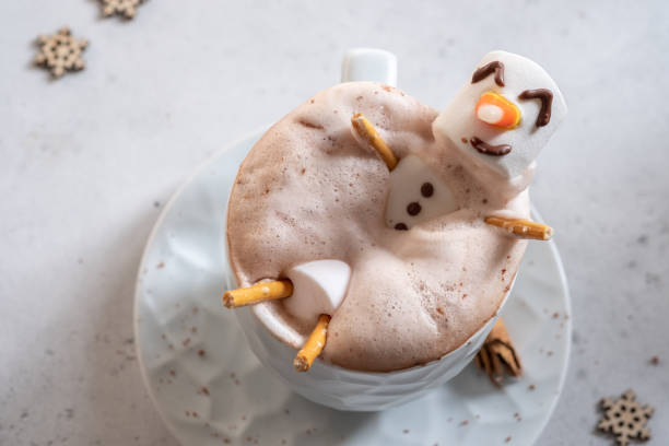 istock Hot chocolate with melted marshmallow snowman 1189712117
