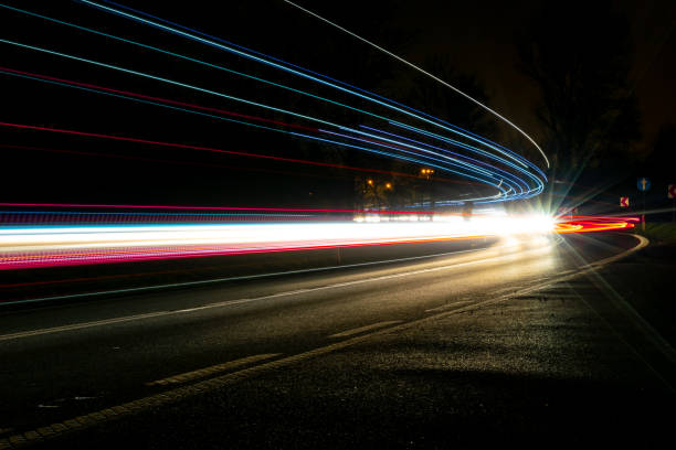 istock lights of cars with night 1189713664