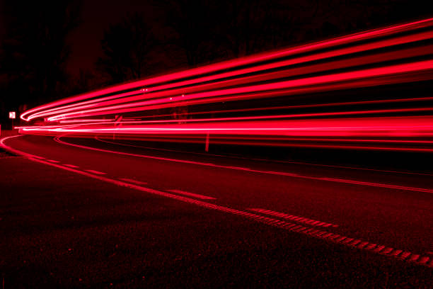 istock lights of cars with night 1189713675