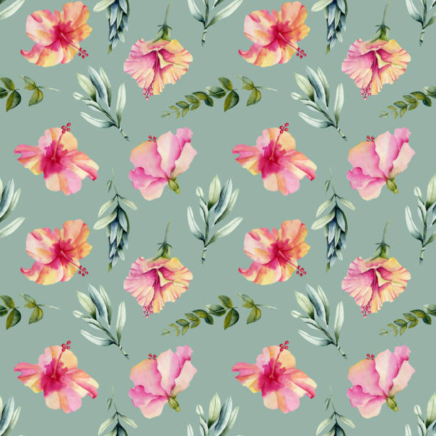 istock Watercolor hibiscus flowers, green branches and leaves seamless pattern, hand painted on a blue background 1189715134